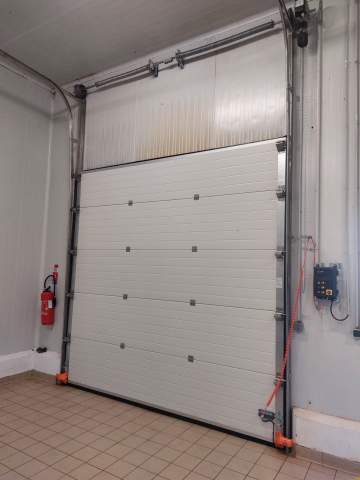 Remplacement d’une porte sectionnelle à Bordeaux