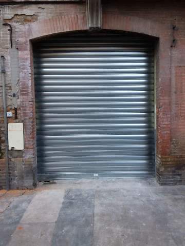 Pose d’un rideau métallique pour un bâtiment situé à Toulouse