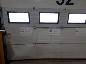 Réparation d’une porte sectionnelle de quai 