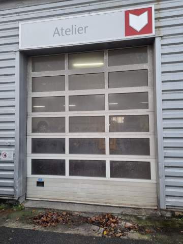 Installation d'une porte souple avec rideau métallique à Toulouse